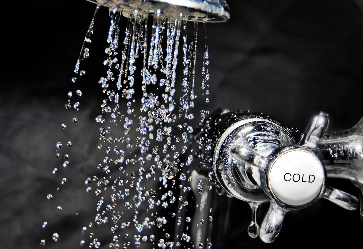 Water flowing from a shower head
